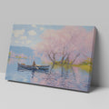 Framed canvas print of Impressionist-style cherry blossoms over a lake with a rowboat