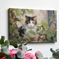 Framed canvas print of impressionist painting featuring a cat with roses and green leaves