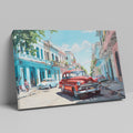 Framed canvas print of a vibrant Cuban street with vintage cars and colourful buildings