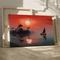 Framed canvas print of a tropical sunset with silhouette of sailboat and palm trees reflection on the water