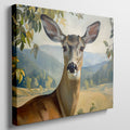 Framed canvas print of a realistic deer in a serene countryside setting with lush foliage