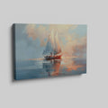 Framed canvas print of an impressionist depiction of a sailboat at sunset with vibrant sky and water reflections