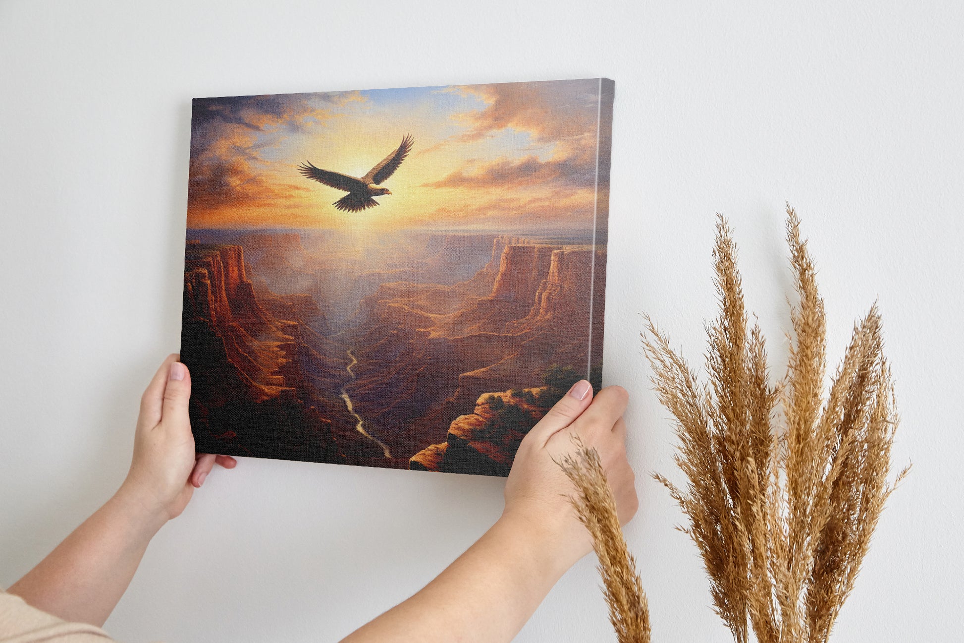 Framed canvas print of a majestic eagle flying over a grand canyon at sunrise with radiant warm colours