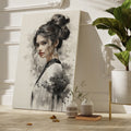 Framed canvas print of an abstract woman portrait in monochrome with dynamic ink splashes