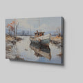 Framed canvas print of a tranquil landscape with a vintage boat moored on calm waters, reflecting autumnal trees