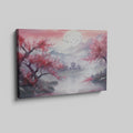 Framed canvas print of an Asian landscape with cherry blossoms and a pagoda at sunset