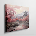 Framed canvas print of a traditional Asian cherry blossom landscape with pagodas and a serene river