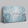 Framed canvas print of serene cherry blossoms with impasto texture on blue background