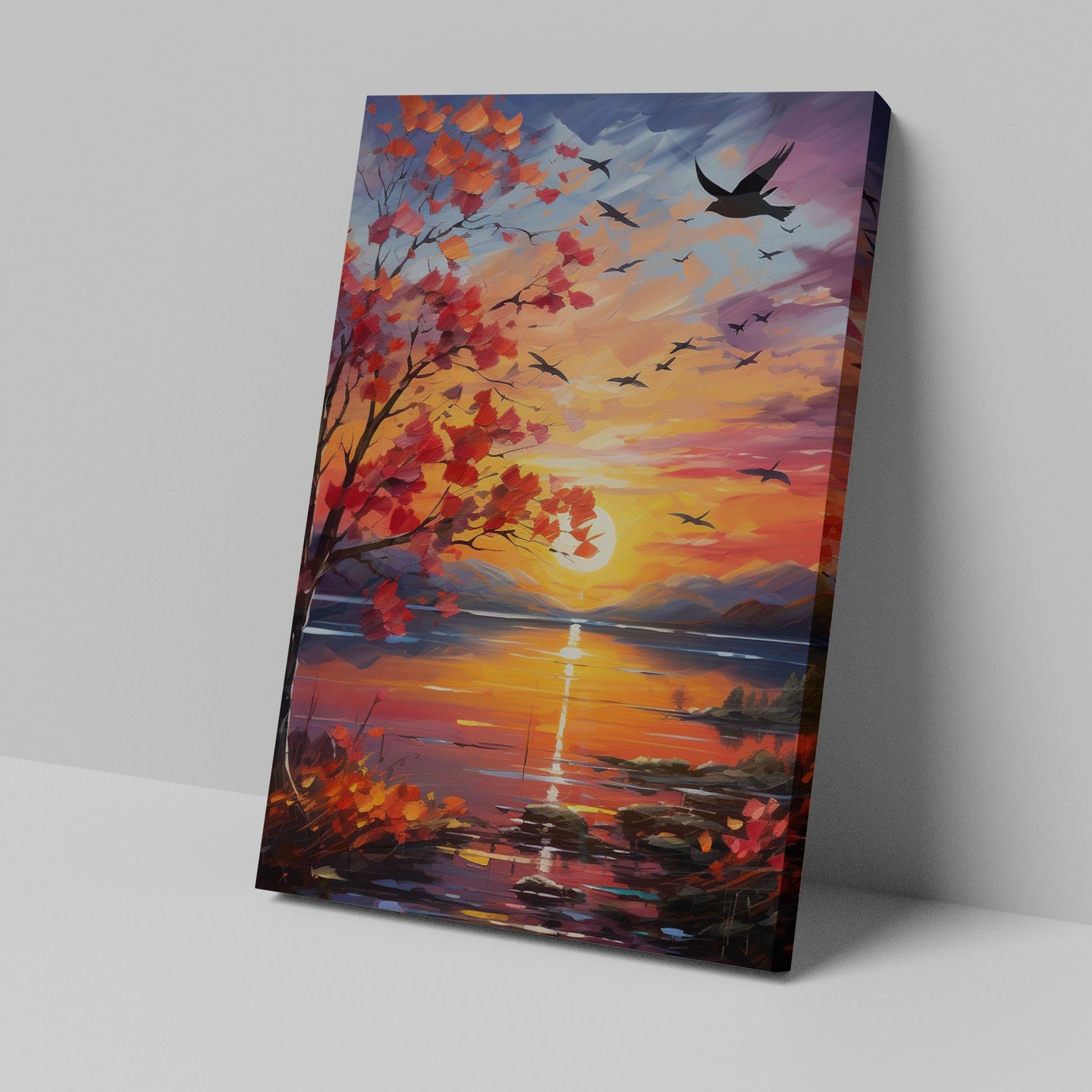 Framed canvas print of an impressionist-style autumn sunset by a lake with birds in flight and vibrant foliage.