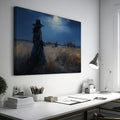 Framed canvas print of a woman in a twilight field under a glowing moon