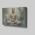 Framed canvas print of a serene Buddha in meditation with ethereal blue and earthy tones