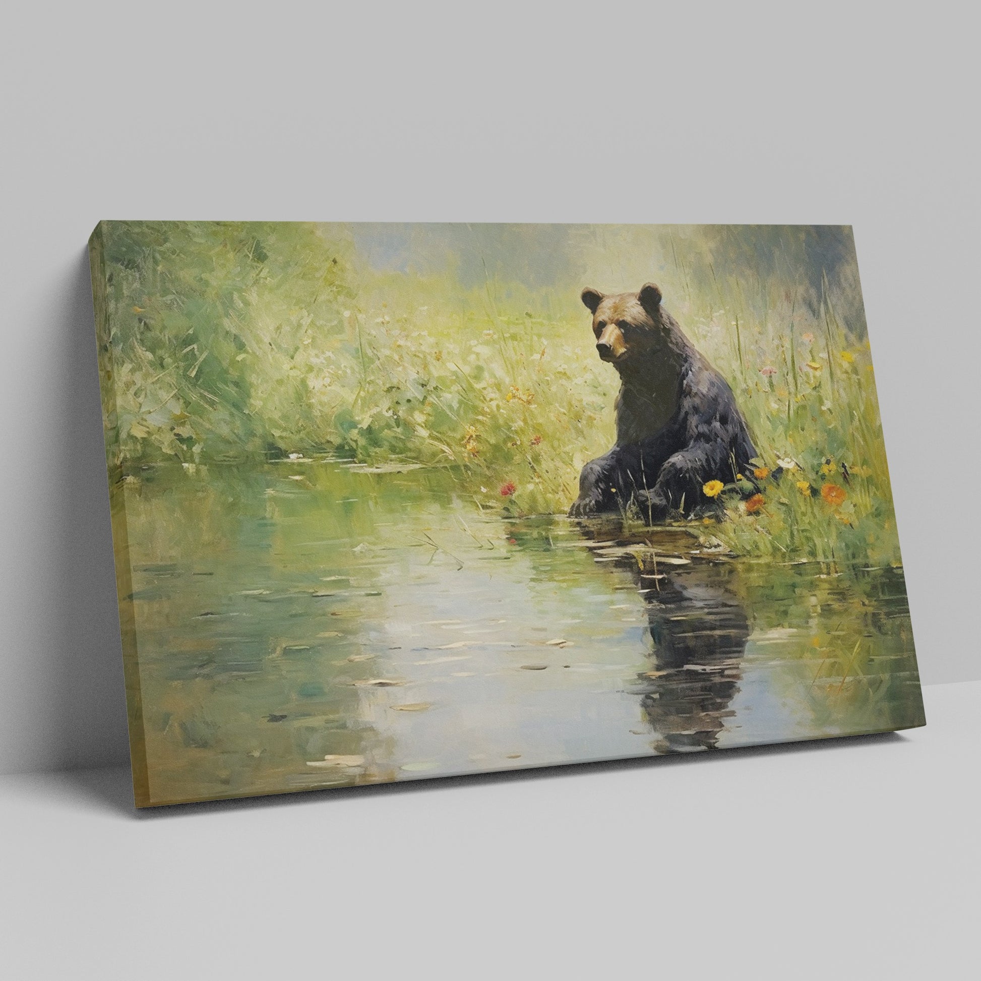 Framed canvas print of a bear sitting by a pond with floral surroundings