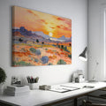 Framed canvas print of an impressionist painting depicting a desert sunset with warm colours