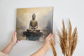 Framed canvas print of a golden Buddha statue with an abstract background