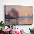 Framed canvas print of an Impressionist-style landscape with a sunset reflecting on a river