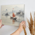 Framed canvas print of traditional Chinese painting featuring a sailboat, misty mountains, and historical architecture