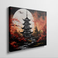 Framed canvas print of a traditional Asian pagoda under a full moon with vibrant autumn red and black colours