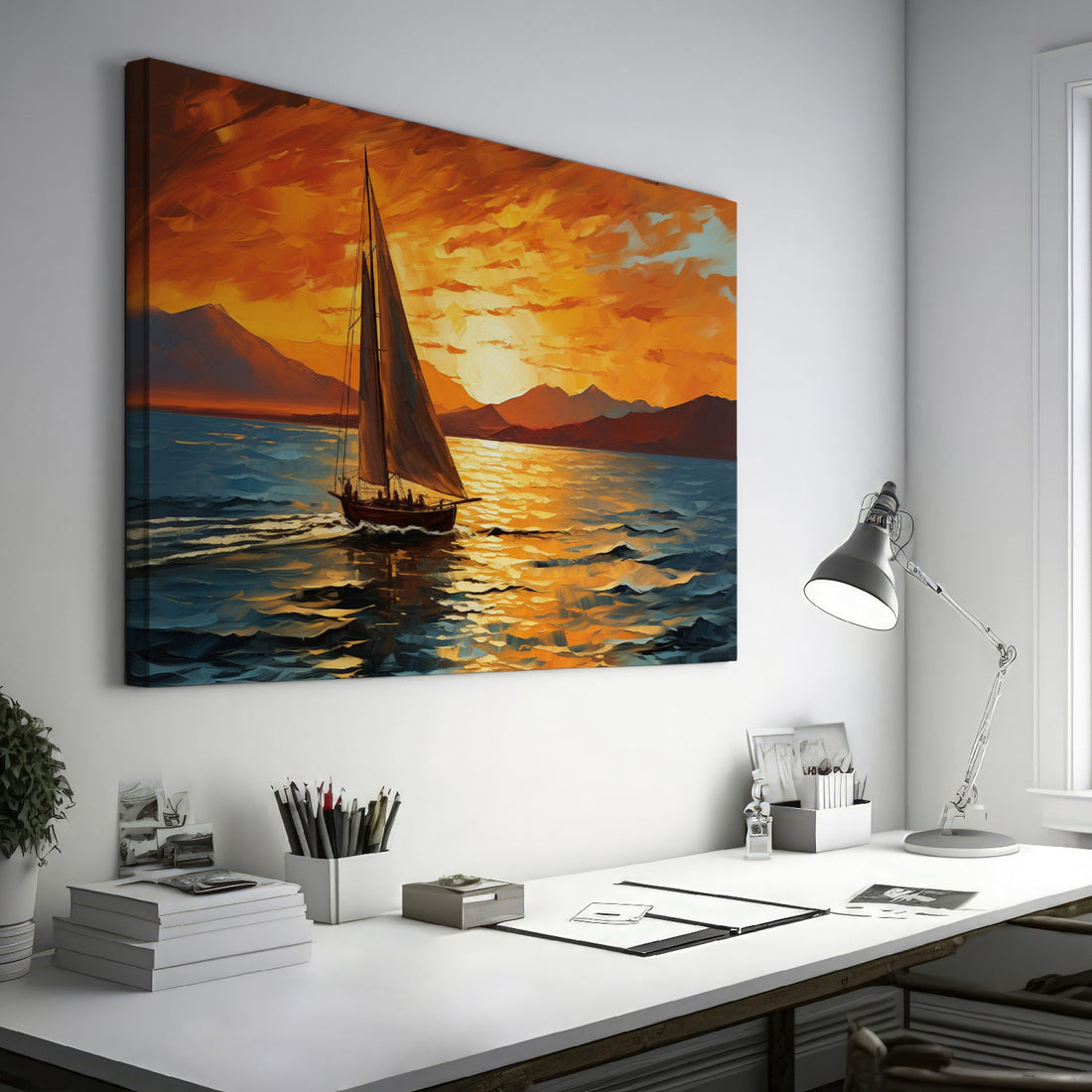 Framed canvas print of a sailboat against a vivid sunset with warm orange and blue tones