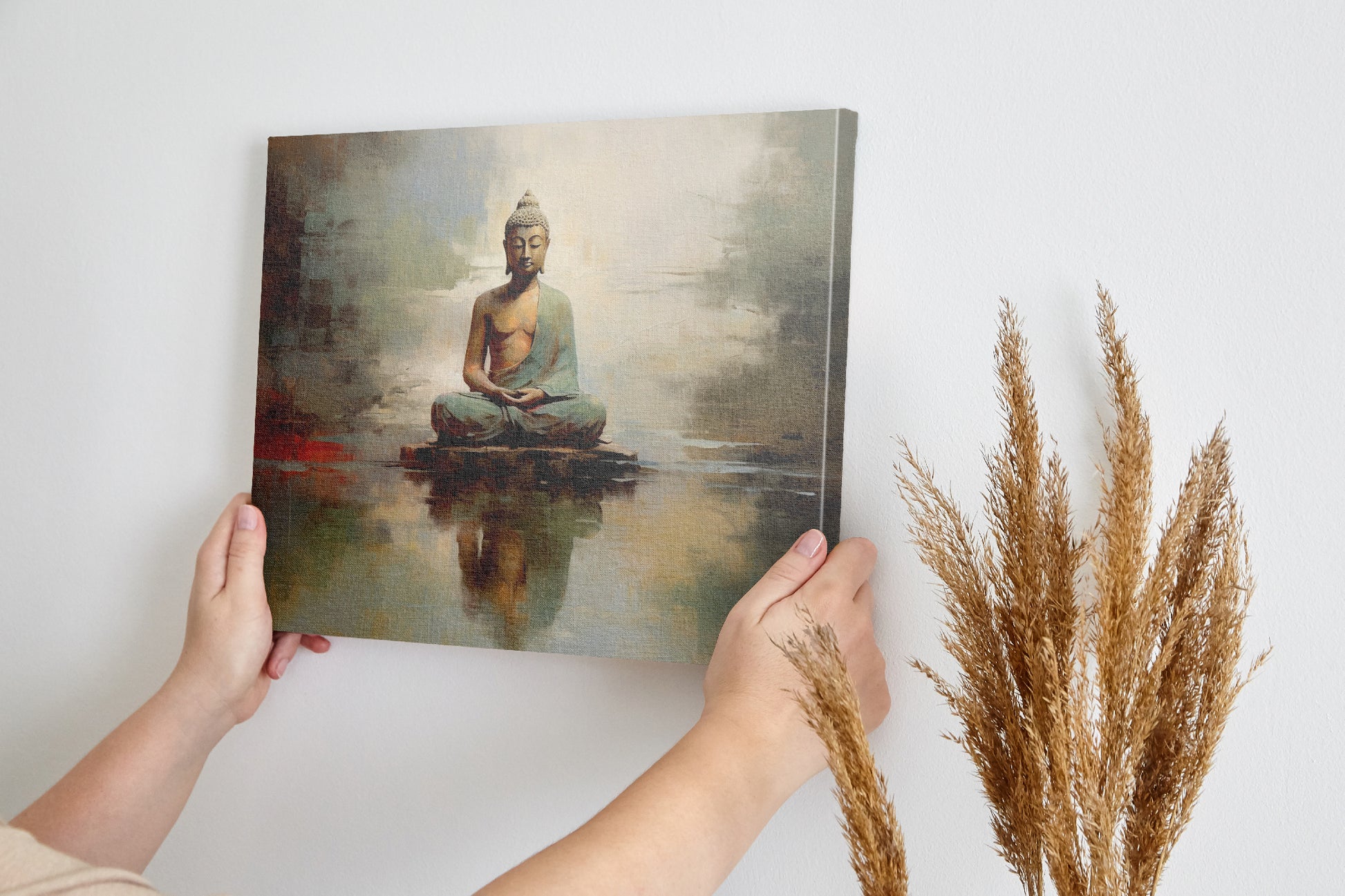 Framed canvas print of a meditative Buddha in warm tones with a reflective water effect