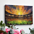 Framed canvas print of an impressionist football stadium with vibrant sunset hues