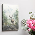 Framed canvas print of a majestic stag set against watercolour misty mountains and a lush forest