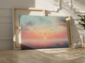 Framed canvas print of a tranquil seascape at sunset with birds and pastel skies