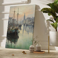 Framed canvas print of a serene harbour scene with sailing boats and a historic lighthouse at dawn