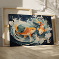 Framed canvas print of two vibrant koi fish with dynamic water movements in a Japanese style illustration