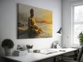 Wall canvas print of a meditative Buddha statue in golden and orange hues reflecting on tranquil waters at sunrise.