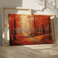 Framed canvas print of an impressionist autumn forest with vibrant red and orange leaves and a misty pathway