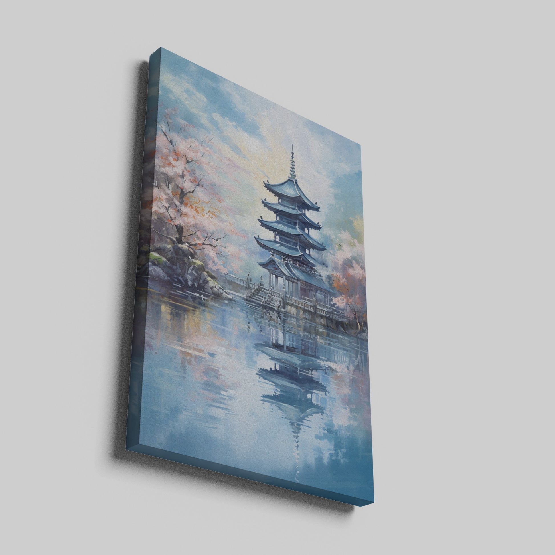 Framed canvas print of a traditional Japanese pagoda and cherry blossoms beside a reflective lake