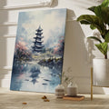 Framed canvas print of an impressionist painting showing a pagoda and cherry blossoms with reflections in water