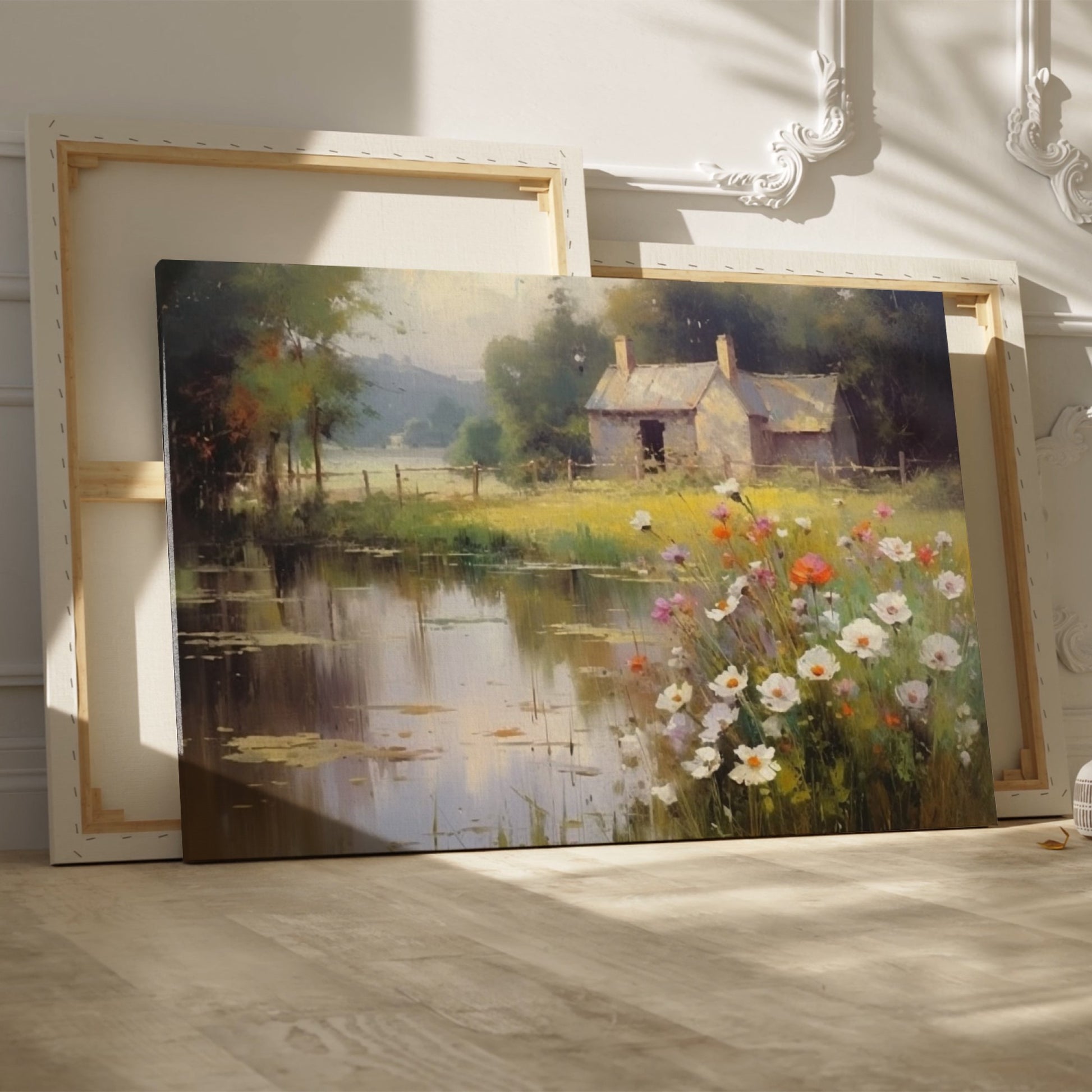 Framed canvas print of a rustic cottage by a peaceful lake with wildflowers in the foreground