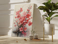 Framed canvas print of cherry blossoms with reflection and ink splashes