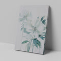 Framed canvas print of modern white floral art with soft green and pastel tones