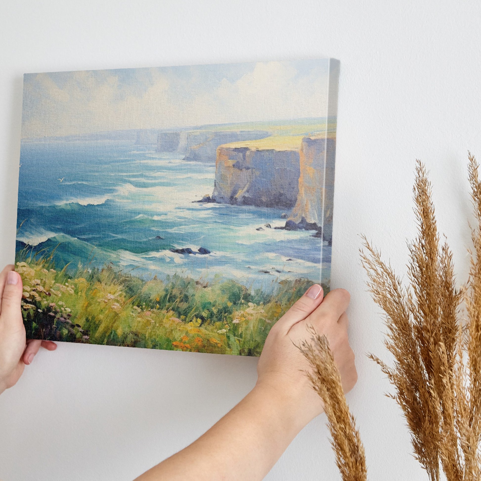 Framed canvas print of an impressionistic seascape with cliffs, wildflowers, and ocean