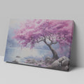 Framed canvas print of a cherry blossom tree by a lake with vivid pink flowers and tranquil blue waters