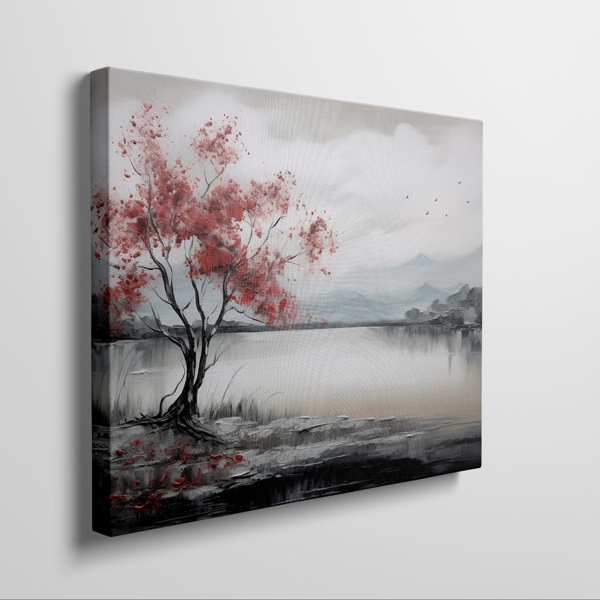 Framed canvas print of a serene landscape painting showcasing a vibrant red tree against a monochrome backdrop with flying birds