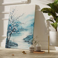 Framed canvas print of serene cherry blossoms by a river in watercolour style