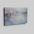 Framed canvas print of cherry blossoms over a tranquil lake with soft pastel colours and a pair of ducks