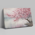 Framed canvas print of a serene cherry blossom tree by a tranquil lake with soft pastels and misty ambience