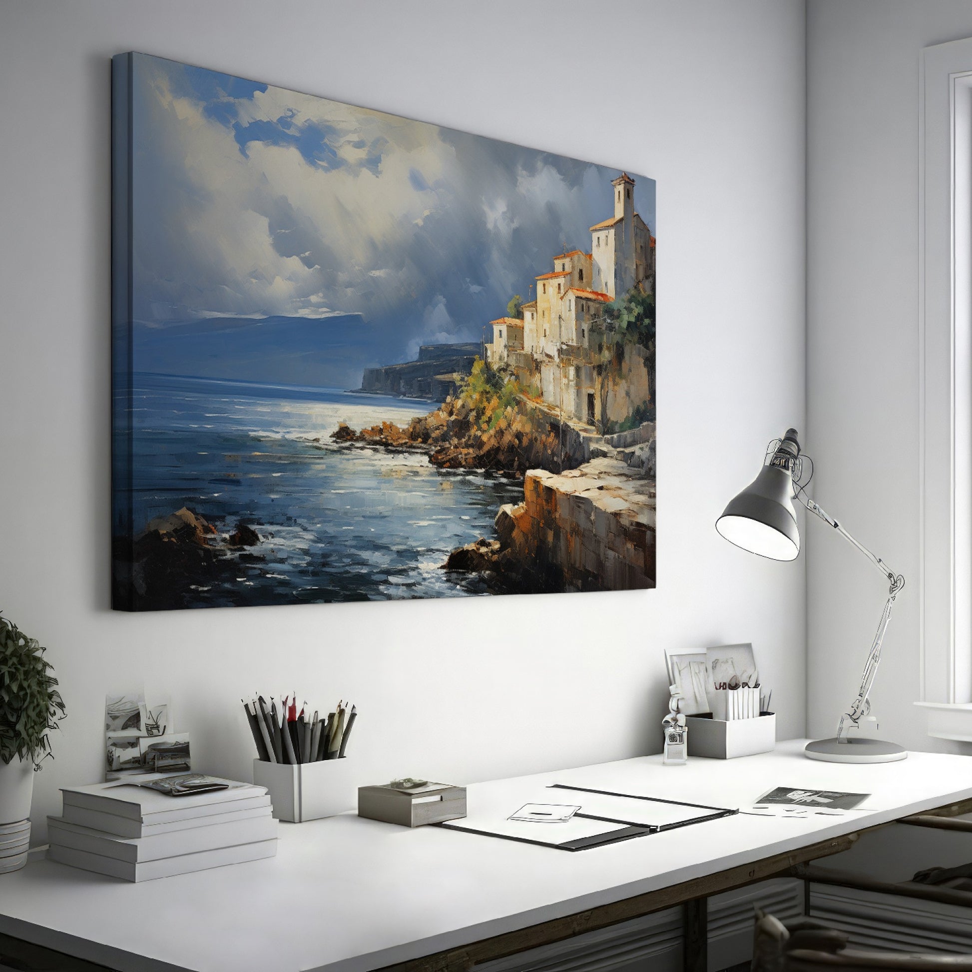 Framed canvas print of a realistic painting depicting a cliffside Mediterranean village with vivid blue sea and sky