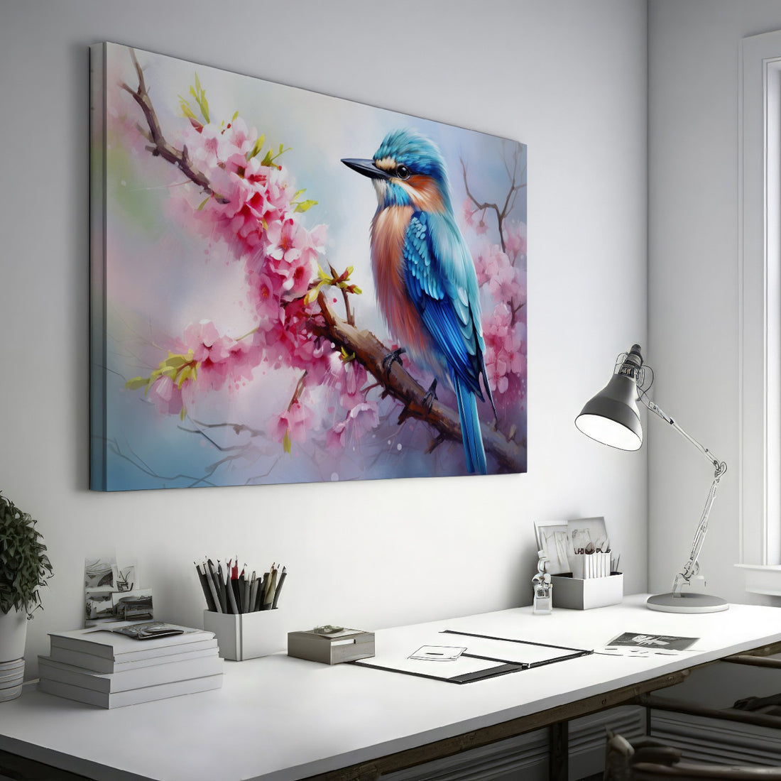 Framed canvas print of a vibrant kingfisher on a flowering cherry blossom branch