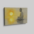 Framed canvas print of a meditative figure with the sun setting over water, reflecting golden tones