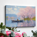 Framed canvas print of Impressionist-style cherry blossoms over a lake with a rowboat