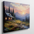 Framed canvas print of a rustic cabin at sunset with a mountainous backdrop