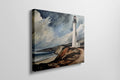 Framed canvas print of a lighthouse by the ocean with dramatic clouds and coastal cliffs