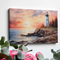 Framed canvas print of a watercolour lighthouse seascape at sunset with vibrant hues of pink, blue, and gold