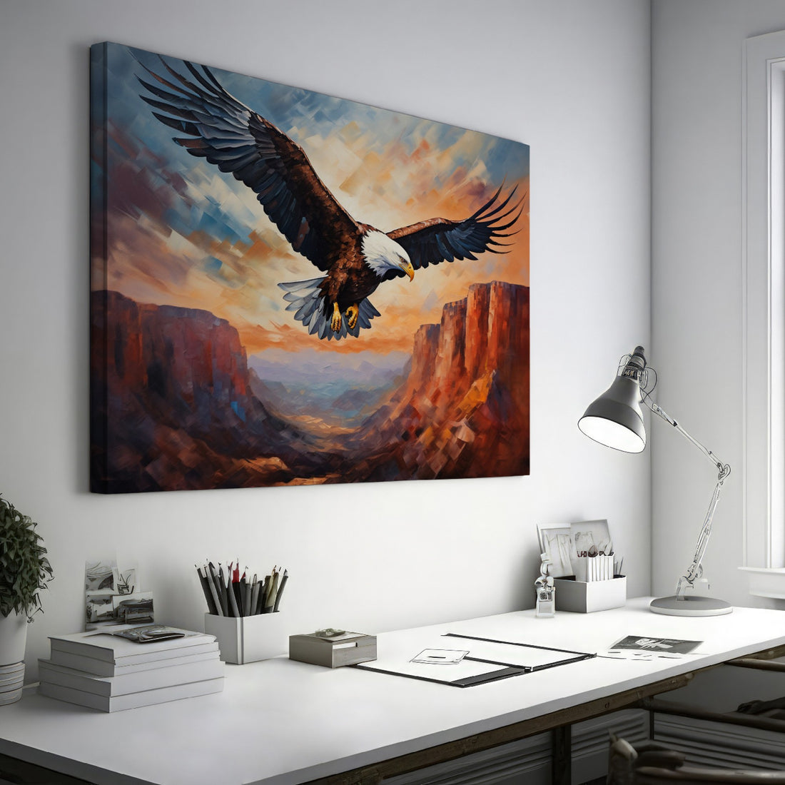 Framed canvas print of a majestic eagle soaring over a canyon at sunset