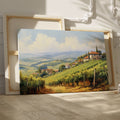 Framed canvas print of a sunny Tuscan landscape with vineyards and rustic houses